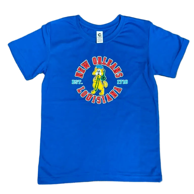 A bright blue short-sleeve t-shirt with a 'New Orleans Louisiana 1791' graphic featuring a yellow bear, laid flat on a white floor.