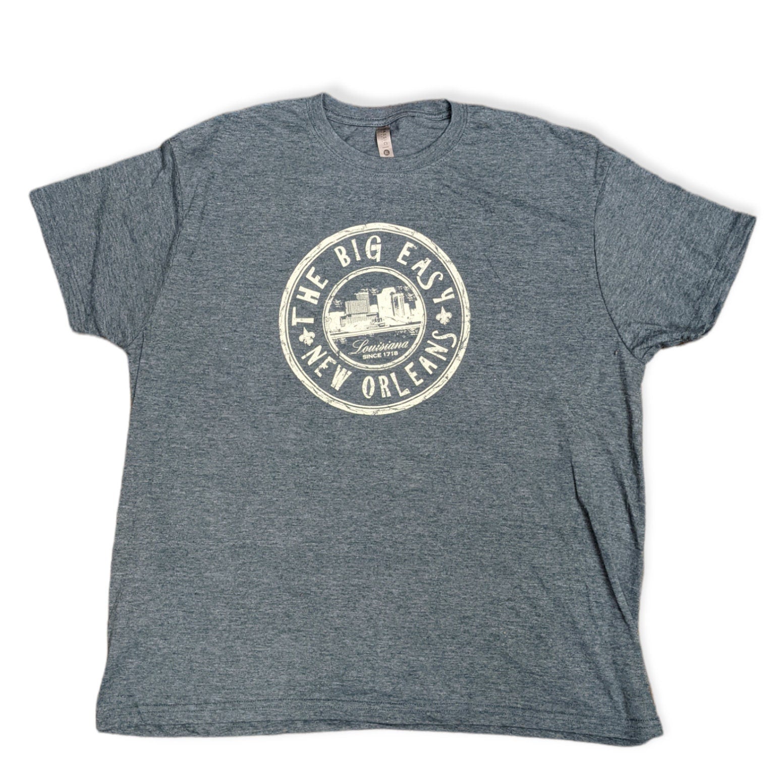 A heather  dark gray short-sleeve t-shirt with a distressed cream-colored circular graphic on the chest that reads 'THE BIG EAST NEW ORLEANS'.