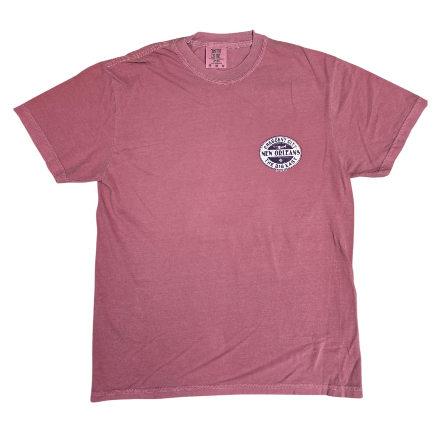 Front view of crimson garment dyed New Orleans Crescent City tee with chest logo