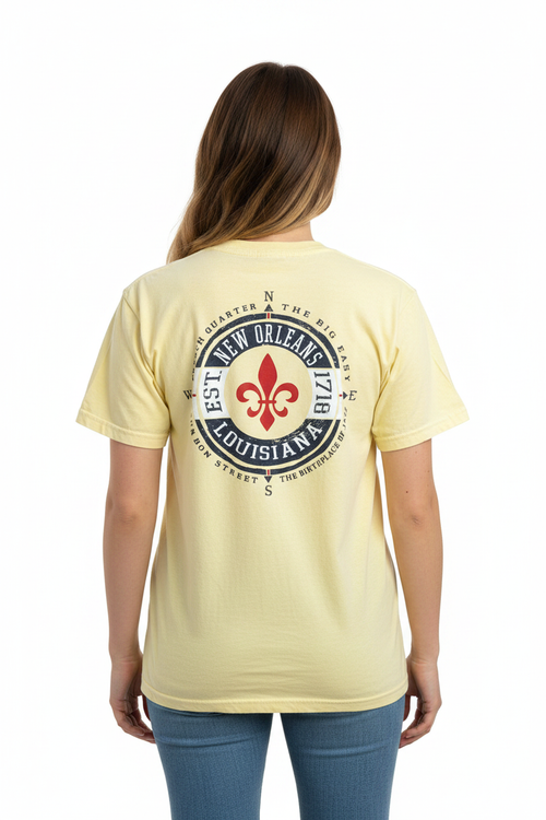 Female model in butter yellow New Orleans tee