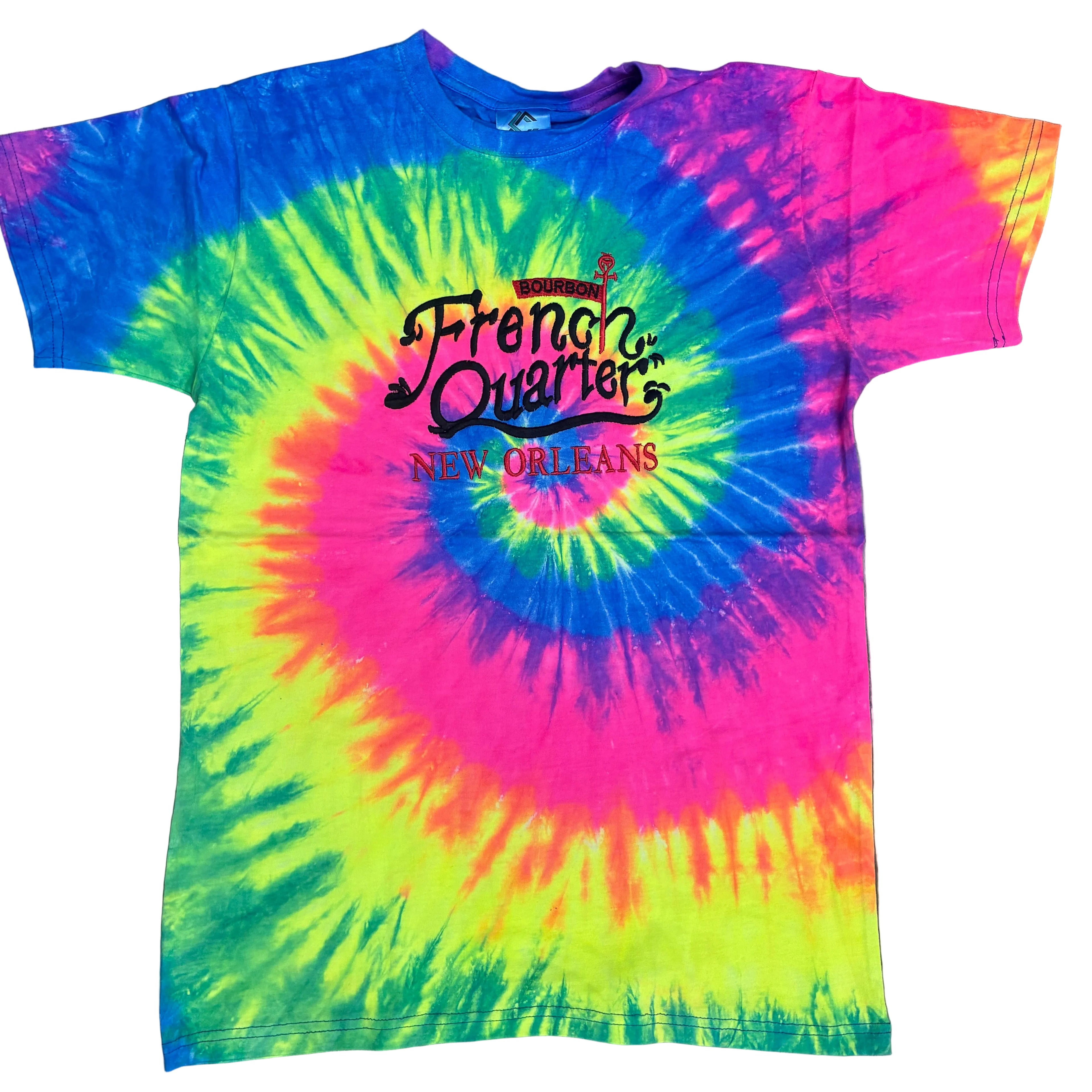 A vibrant tie-dye t-shirt with a spiral pattern of pink, blue, green, and yellow, featuring a black graphic print that reads 'French Quarter New Orleans' on the chest, laid flat on a white background.