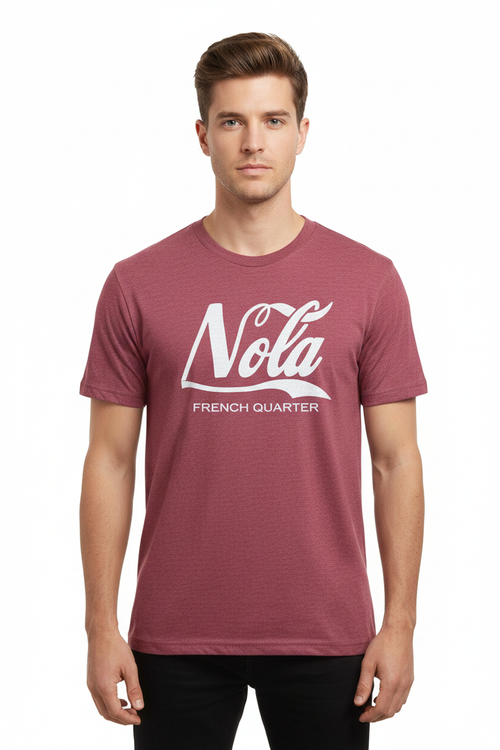 A man wearing a heathered red  t-shirt with a white graphic print that reads 'NOLA FRENCH QUARTER' in a retro script font, shown against a plain white background.