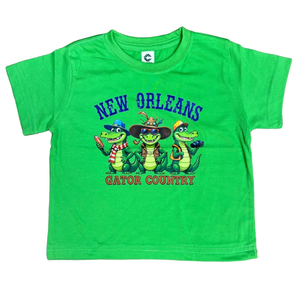 A bright green short-sleeve kids' t-shirt with a 'New Orleans Gator Country' graphic featuring three cartoon alligators.